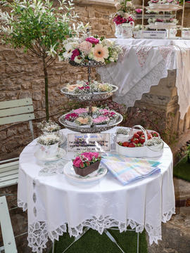 Afternoon tea on a little table by the font