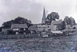 A view of St Mary's steeple from Sandfords Field. There are far more cottages between the church ...