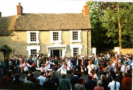 Two visiting teams outside the George & Dragon, Abingdon Morris waiting to dance