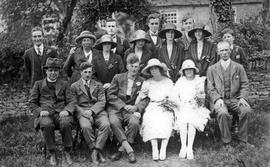 Albert and Mary Elizabeth Townsend and family (Castle View Farm) group with vicar, possibly 4 set...