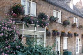 Hanging baskets outside Adrian Simmonds' Store 1983 & 1984