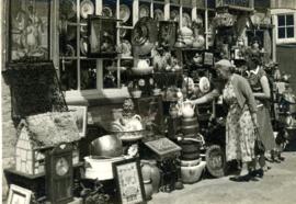 Mr & Mrs Hill & son Arthur Hill's antique cum bric-a-brac shop in Bridge Street