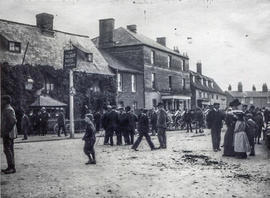 Horse Fair outside the Talbot. Carts outside Thompsons, the high class grocers