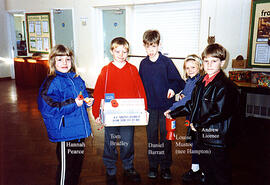 Children from Bampton school ready to go around and sell poppies. Named