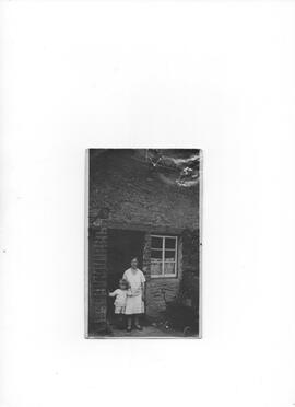 Mrs Amos and son Bert at Workhouse Yard ,  Weald..