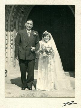 Wedding photo taken by the west door of St Mary's of Charlie and Joan Buckingham.