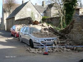 Wall by plot in Church Close owned by Boggis Rolfe wrecks two cars March 10th 2011