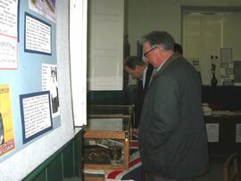 Looking at WW1 exhibition in Bampton Museum. February 2004.