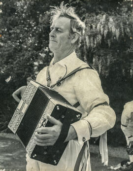 Francis Sherfold, squire, playing melodeon