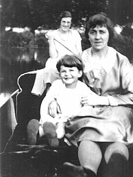 Billy Mathews and mother on a boat at Radcot Bridge.