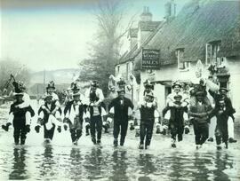 Morris men carried through floods by Elephant & Castle