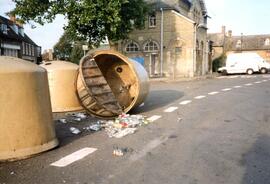 Recycling container tipped over