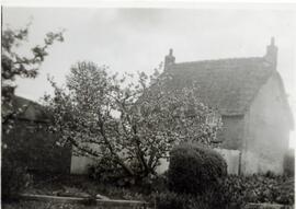 Sweet Briar Cottage, when thatched, once called The Patch, and the home of agricultural workers f...